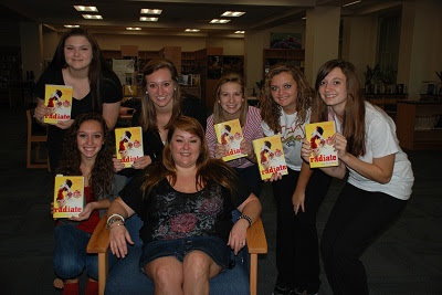 Marley Gibson with readers holding copies of Radiate