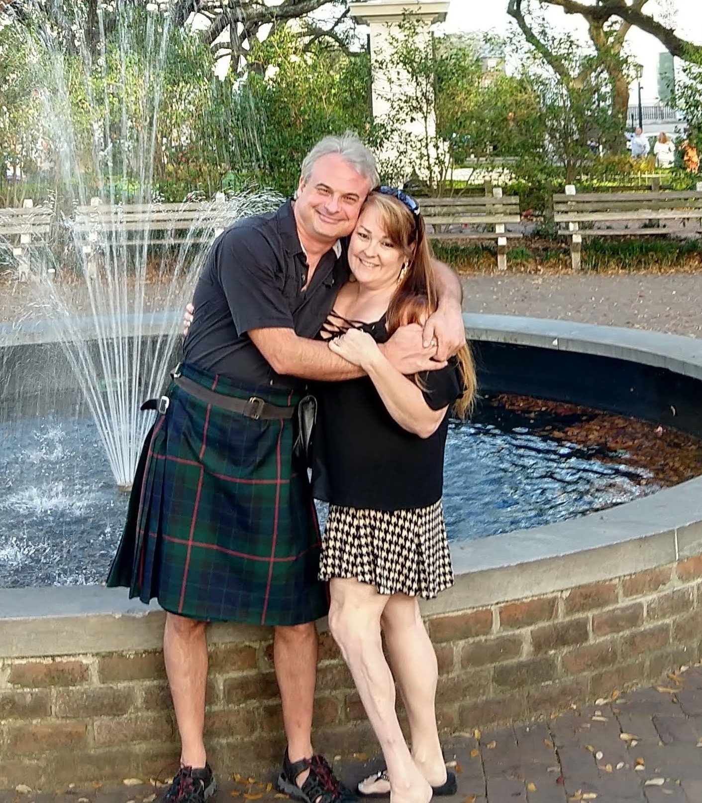 Patrick Burns and Marley Gibson at a Savannah fountain, Patrick in his kilt